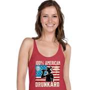 Racerback tank with '100% American Drunkard' text, man drinking a bottle of beer wearing a trucker hat, and distressed American flag background for the 4th of July