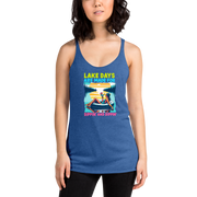 Racerback tank with "Lake Days Are Made for Sipping and Dipping," featuring a woman on a tube float with a cocktail, against a lake and sunset.