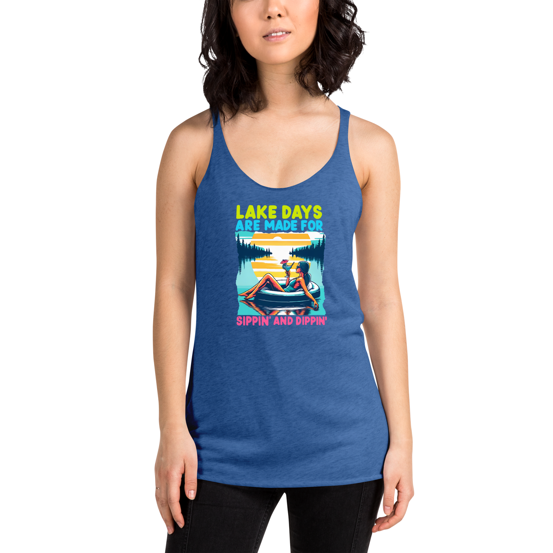 Racerback tank with "Lake Days Are Made for Sipping and Dipping," featuring a woman on a tube float with a cocktail, against a lake and sunset.