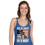 'Give Me Liberty or Give Me Whiskey' text, Statue of Liberty holding a shot glass, and distressed American flag background