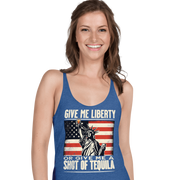 Racerback tank with Give Me Liberty or Give Me a Shot of Tequila text, Statue of Liberty holding a shot glass, and distressed American flag background. Perfect for 4th of July.