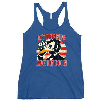 Racerback tank with Day Drinking Like Abe Lincoln text, image of Abe Lincoln drinking a glass of beer, and distressed American flag background. Perfect for 4th of July.