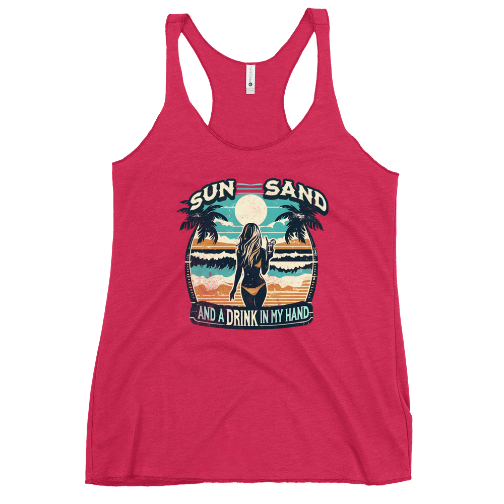 Beach scene on 'Sun, Sand, and a Drink in My Hand' racerback tank, with woman holding cocktail.