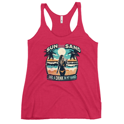 Beach scene on 'Sun, Sand, and a Drink in My Hand' racerback tank, with woman holding cocktail.