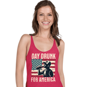 Racerback tank with Day Drunk for America text, silhouette of a man drinking a bottle of beer, and distressed American flag background. Perfect for 4th of July.