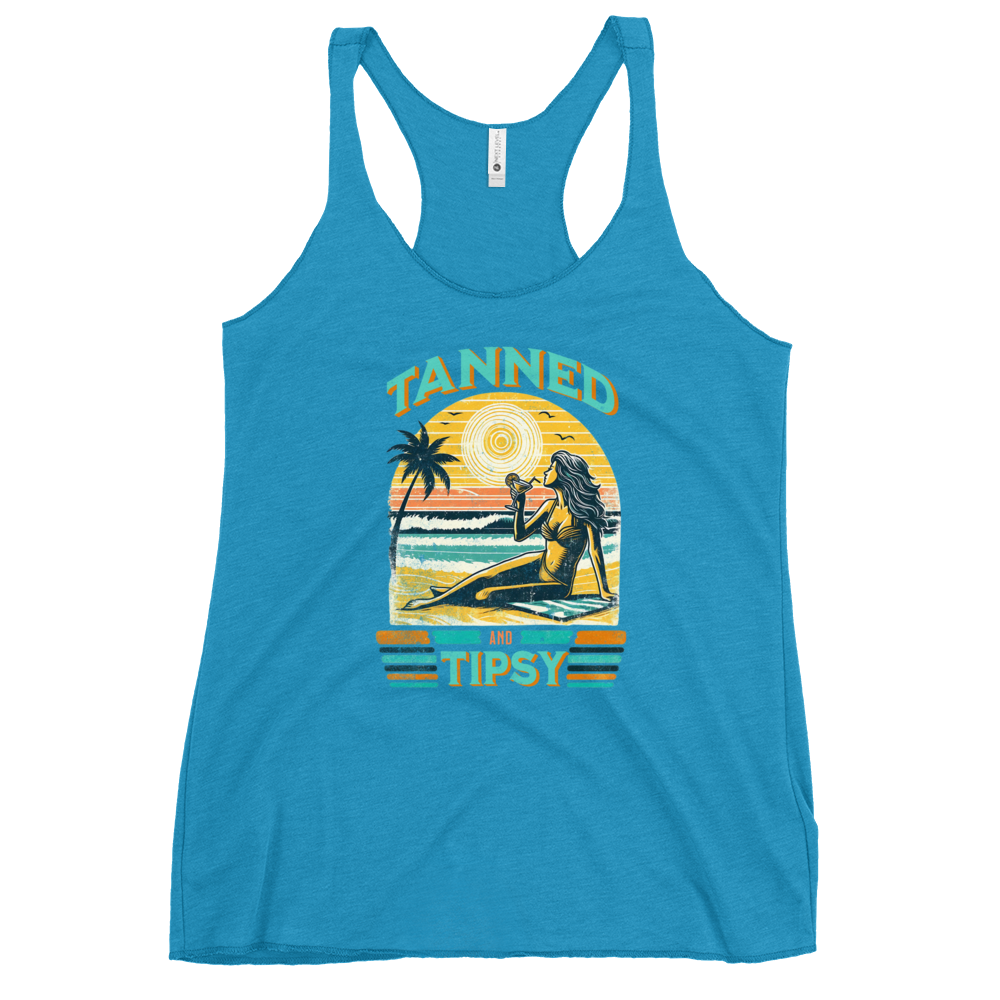 Retro 'Tanned and Tipsy' racerback tank with a woman enjoying a sunset cocktail on the beach, ideal for summer beach parties and day drinking.