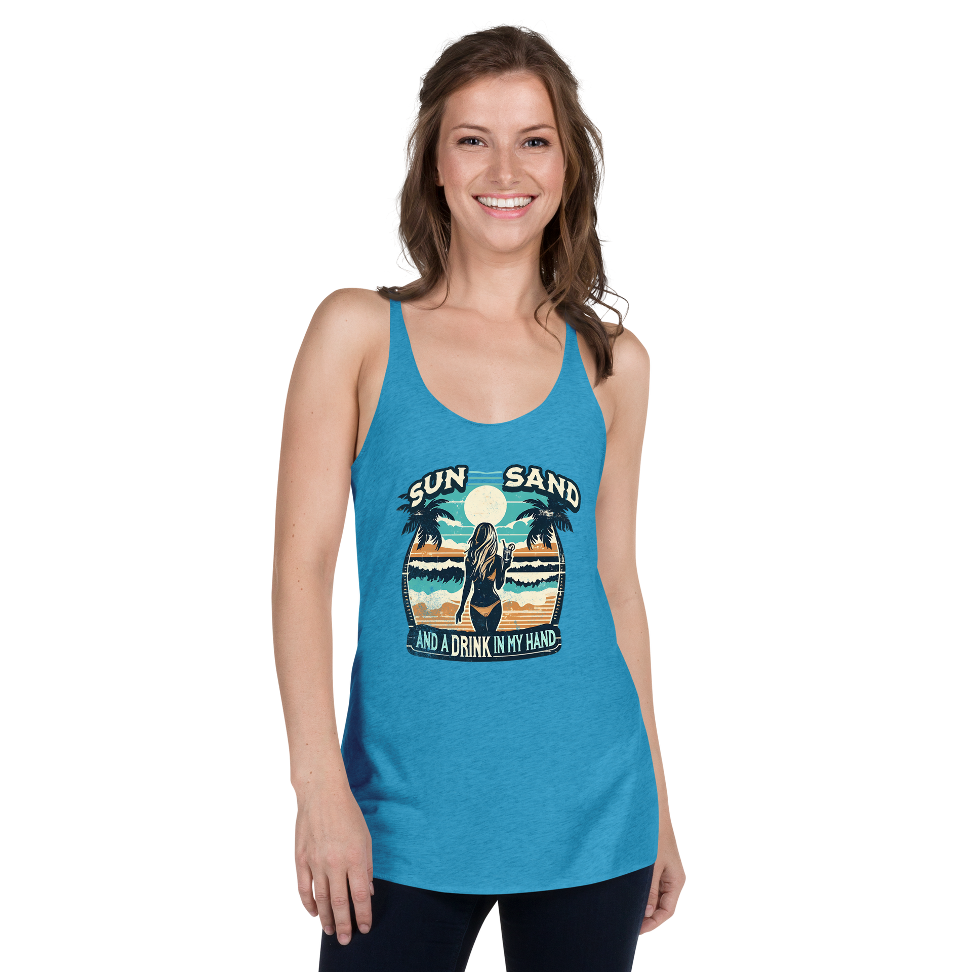 Beach scene on 'Sun, Sand, and a Drink in My Hand' racerback tank, with woman holding cocktail.