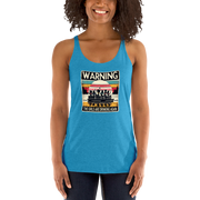 Racerback tank featuring "Warning: The Girls Are Drinking Again" with an illustration of girls drinking on a pontoon boat at sunset.