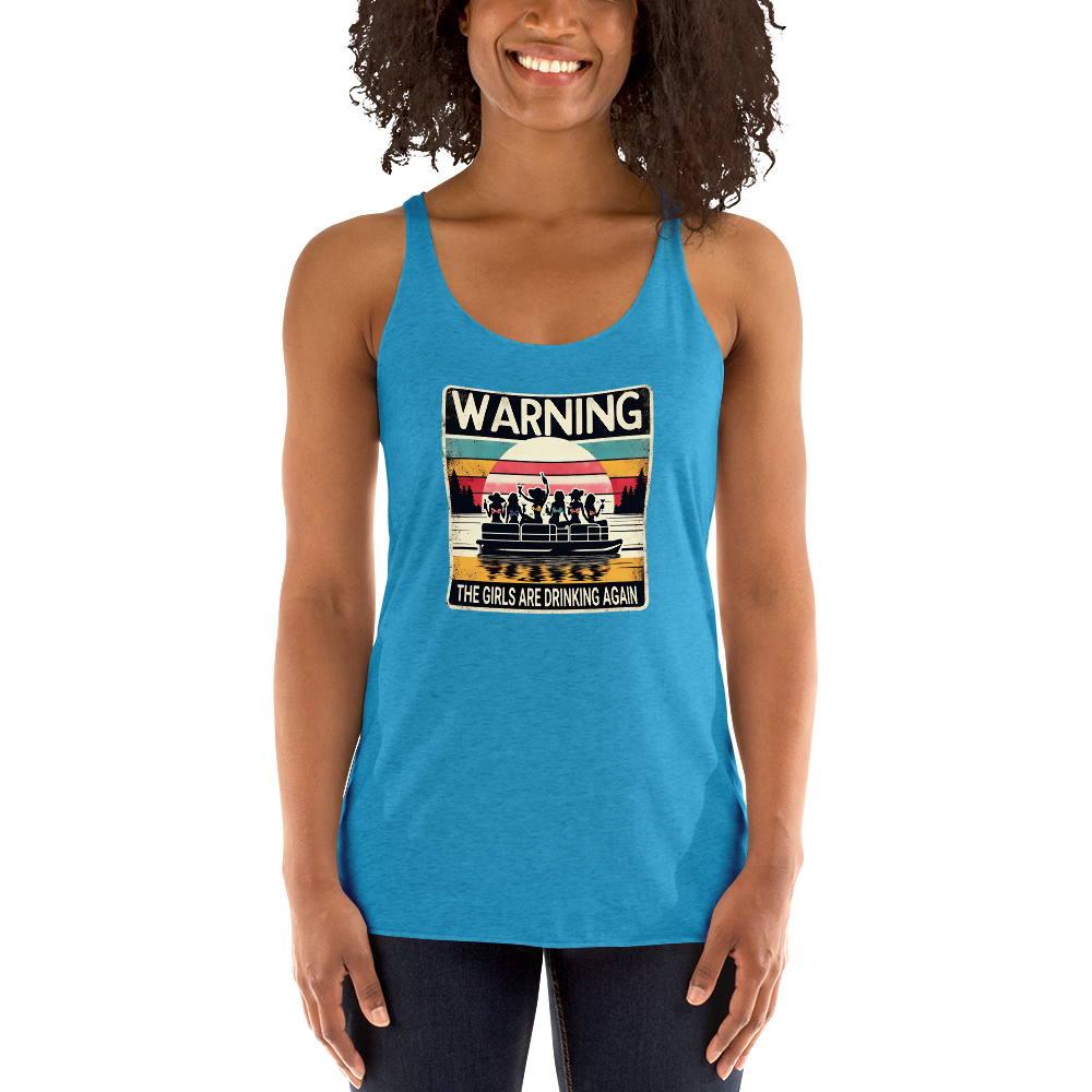 Racerback tank featuring "Warning: The Girls Are Drinking Again" with an illustration of girls drinking on a pontoon boat at sunset.