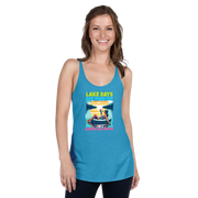 Racerback tank with "Lake Days Are Made for Sipping and Dipping," featuring a woman on a tube float with a cocktail, against a lake and sunset.