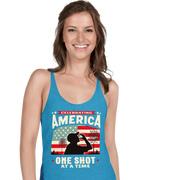 Racerback tank with Celebrating America One Shot at a Time text, silhouette of a man drinking a shot, and distressed American flag background. Perfect for 4th of July.