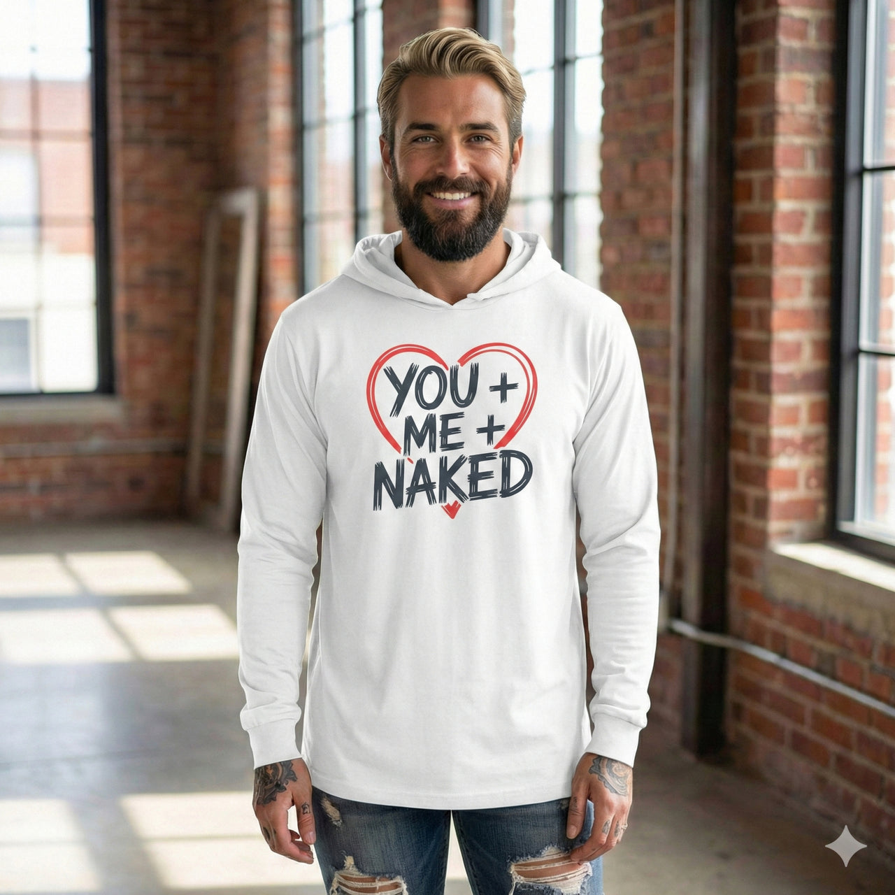 blond male model wearing white featherweight hoodie with the phrase "You + Me + Naked" with a minimalist sketched valentine's heart surrounding the phrase to complete the design
